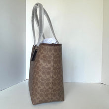 Load image into Gallery viewer, Brown patterned tote bag with a white interior on a white background