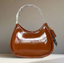 Load image into Gallery viewer, Brown handbag with a gray handle on a white background