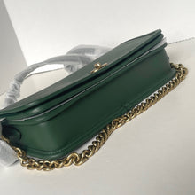 Load image into Gallery viewer, Green handbag with gold chain detail on a white background