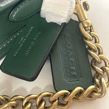 Load image into Gallery viewer, Green Coach bag tag with gold chain on a white background