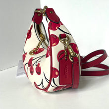 Load image into Gallery viewer, Coach handbag with red and white design on a white background