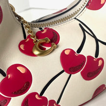 Load image into Gallery viewer, Handbag with red cherry design and gold chain detail