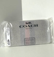 Load image into Gallery viewer, Coach wallet in packaging on a light gray background