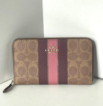 Load image into Gallery viewer, Coach wallet with multicolor pattern on a white background