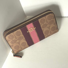 Load image into Gallery viewer, Designer wallet with brown and pink pattern on a white background