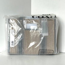 Load image into Gallery viewer, Packaged Coach handbag on a white background
