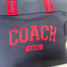 Load image into Gallery viewer, Gray bag with red 'COACH' and '1941' text on a white background