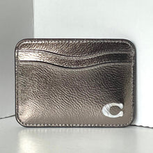 Load image into Gallery viewer, Metallic cardholder with a brand logo on a white background