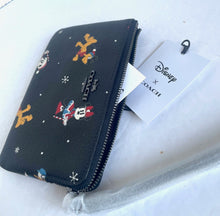 Load image into Gallery viewer, Coach X Disney Corner Zip Wristlet Holiday Black Minnie Mickey Daffy Pluto CN031