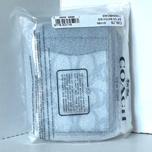 Load image into Gallery viewer, Plastic-wrapped product with a visible brand label on a white background