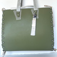 Load image into Gallery viewer, Green tote bag with decorative studs on a white background