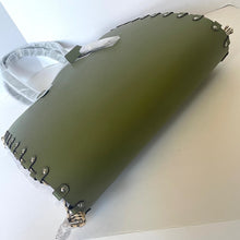 Load image into Gallery viewer, Green leather bag with metal accents on a white background