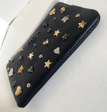 Load image into Gallery viewer, Black phone case with gold and silver studs on a white background
