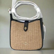 Load image into Gallery viewer, Small brown textured bag with a black strap on a white background