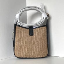 Load image into Gallery viewer, Handbag with woven design and black trim on a white background