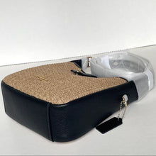 Load image into Gallery viewer, Black leather case with cork interior and clear cover on a white background
