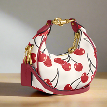 Load image into Gallery viewer, Handbag with cherry pattern on a white background