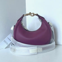 Load image into Gallery viewer, Purple handbag with a matching strap on a white background