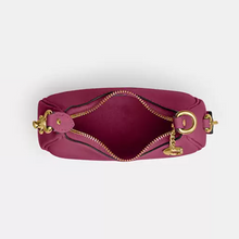 Load image into Gallery viewer, Pink pouch with gold zipper and hardware on a white background