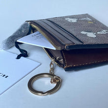 Load image into Gallery viewer, Cardholder with keychain on a light blue background