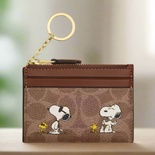 Load image into Gallery viewer, Coach X Peanuts 2025 Mini Skinny Id Case Snoopy CBT14 Brown Signature Canvas