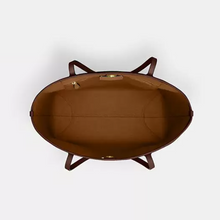 Load image into Gallery viewer, Brown leather bag on a white background