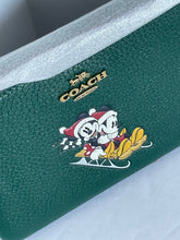 Load image into Gallery viewer, Coach x Disney Corner Zip Wristlet Green Leather Sled Minnie Mickey Holiday CN025