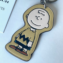 Load image into Gallery viewer, CoachxPeanuts2025CharlieBrownLeatherBagCharmKeychainCBG59Anniversary_2
