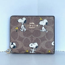Load image into Gallery viewer, Coach x Peanuts 2025 Snap Wallet CBN89 Snoopy 75th Anniversary Woodstock Brown