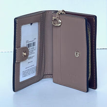 Load image into Gallery viewer, Coach x Peanuts 2025 Snap Wallet CBN89 Snoopy 75th Anniversary Woodstock Brown