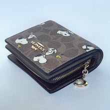 Load image into Gallery viewer, Coach x Peanuts 2025 Snap Wallet CBN89 Snoopy 75th Anniversary Woodstock Brown