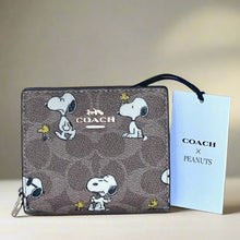 Load image into Gallery viewer, Coach x Peanuts 2025 Snap Wallet CBN89 Snoopy 75th Anniversary Woodstock Brown