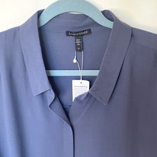 Load image into Gallery viewer, Blue shirt on a hanger with a visible tag, featuring the brand 'Bilfen Fisher'.