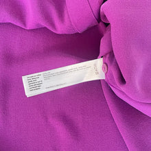 Load image into Gallery viewer, Close-up of a purple fabric with a label on it