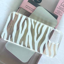 Load image into Gallery viewer, Clear phone case with white zebra pattern on a white background