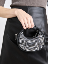 Load image into Gallery viewer, woman holding a Black handbag with silver studs