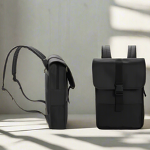 Load image into Gallery viewer, Black backpack displayed on a website with navigation tabs at the top.