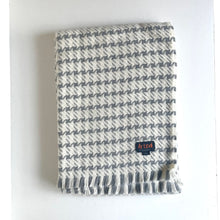 Load image into Gallery viewer, Woven blanket with a striped pattern on a white background