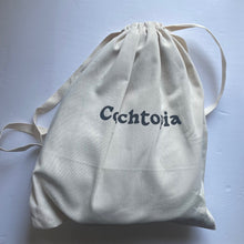 Load image into Gallery viewer, Drawstring bag with 'Cichtoia' branding on a light blue background