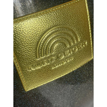 Load image into Gallery viewer, Gold leather wallet with embossed logo on a black background