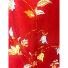 Load image into Gallery viewer, Red fabric with white and yellow floral patterns