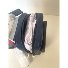 Load image into Gallery viewer, Blue leather pouch with a zipper on a white surface