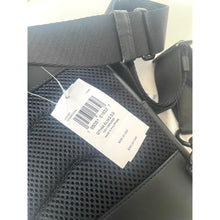 Load image into Gallery viewer, Black bag with a visible tag on a white background