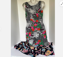 Load image into Gallery viewer, Floral dress with sequin embellishments on a mannequin against a white background