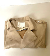 Load image into Gallery viewer, A folded beige trench coat with a wide collar and shoulder epaulet, displayed on a light off-white background. The brand name 'Aritzia' is visible on the inner neck label.