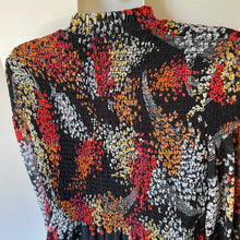 Load image into Gallery viewer, Multicolored patterned top on a mannequin against a white background