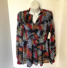 Load image into Gallery viewer, Multicolored patterned blouse on a mannequin against a white background