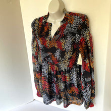 Load image into Gallery viewer, Multicolored patterned blouse on a mannequin against a white background