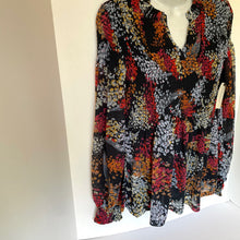 Load image into Gallery viewer, Multicolored patterned blouse on a mannequin against a white background