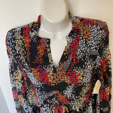 Load image into Gallery viewer, Colorful patterned blouse on a mannequin with a white background